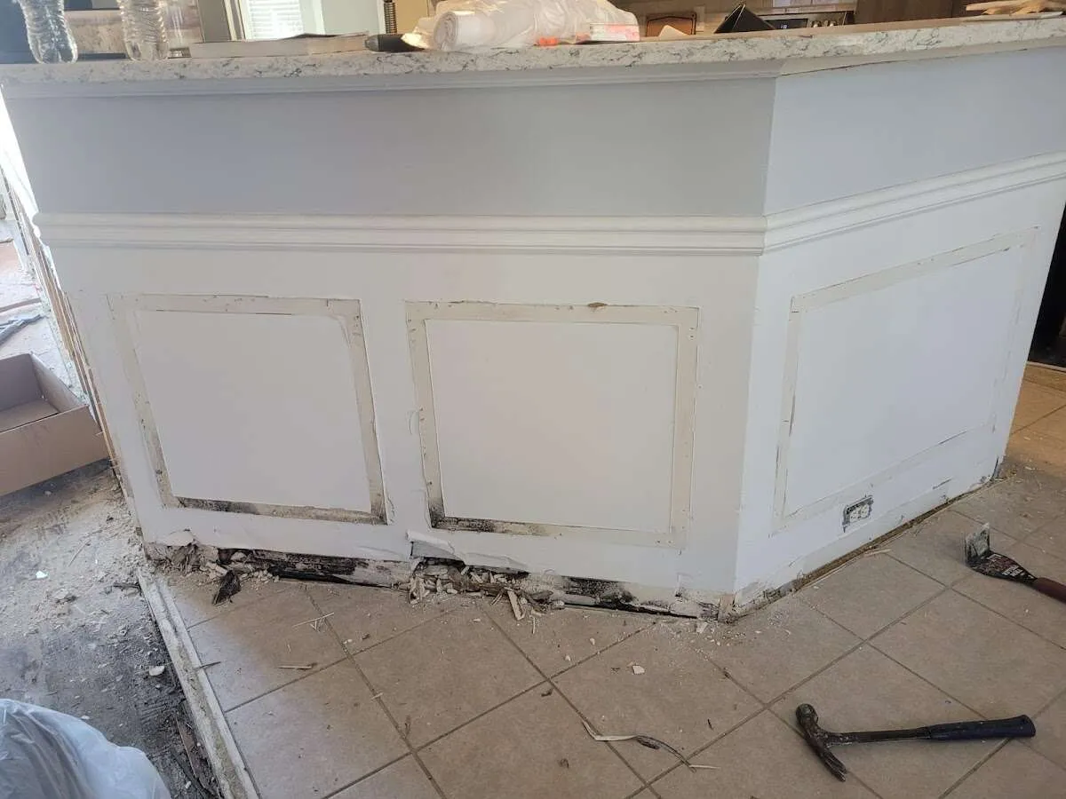 Water damage and mold on kitchen during Storm Damage Restoration in Ocoee